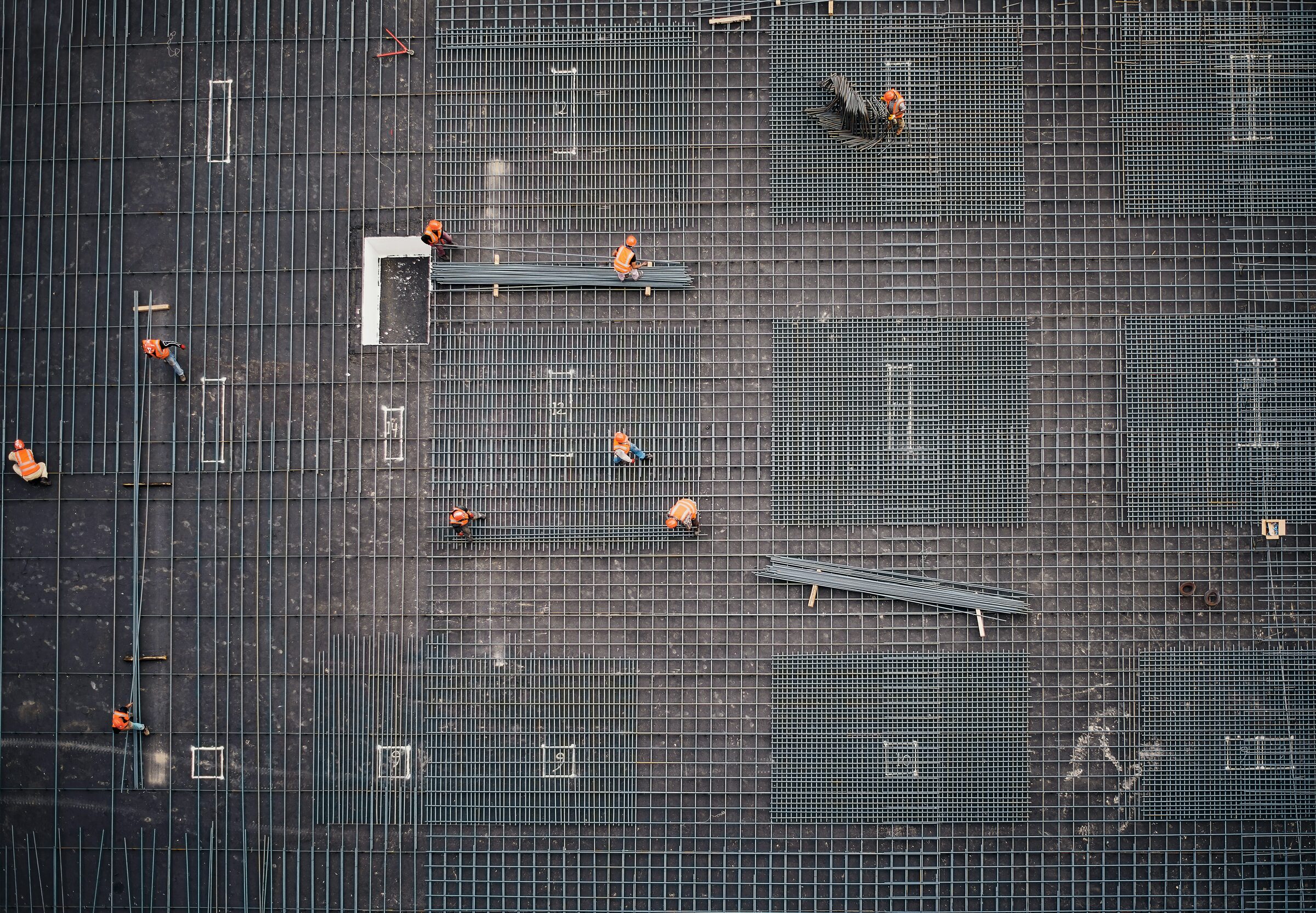 Construction team working across a building structure